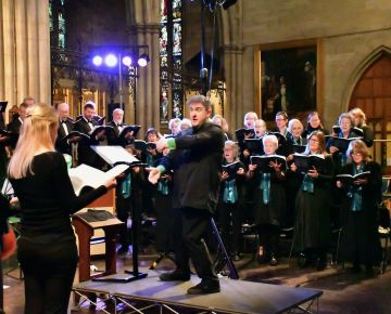 Back to Bach: Lee Dunleavy in action, with the ladies of choir II and the basses in the background